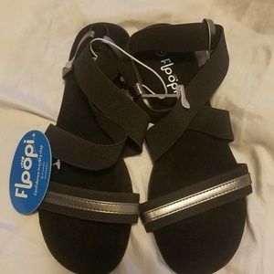 Brand new black and silver Floopi sandals. 7M.